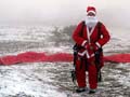 le pere noel sous son parapente